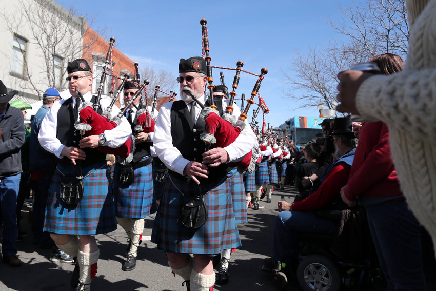 Centennial State Pipes and Drums walked the streets of Olde Town playing bagpipes during the festival.